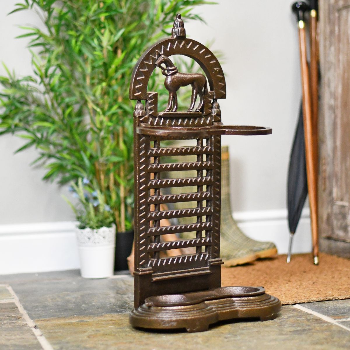 Entrance hall umbrella stand finished in warm bronze Entrance hall umbrella stand finished in warm bronze