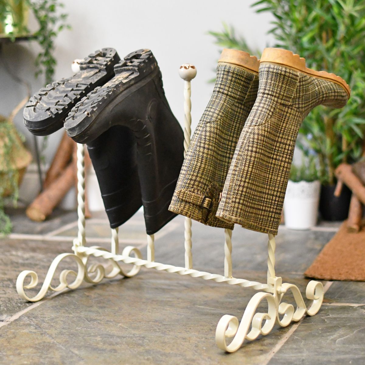 Wrought iron boot rack finished in antique cream