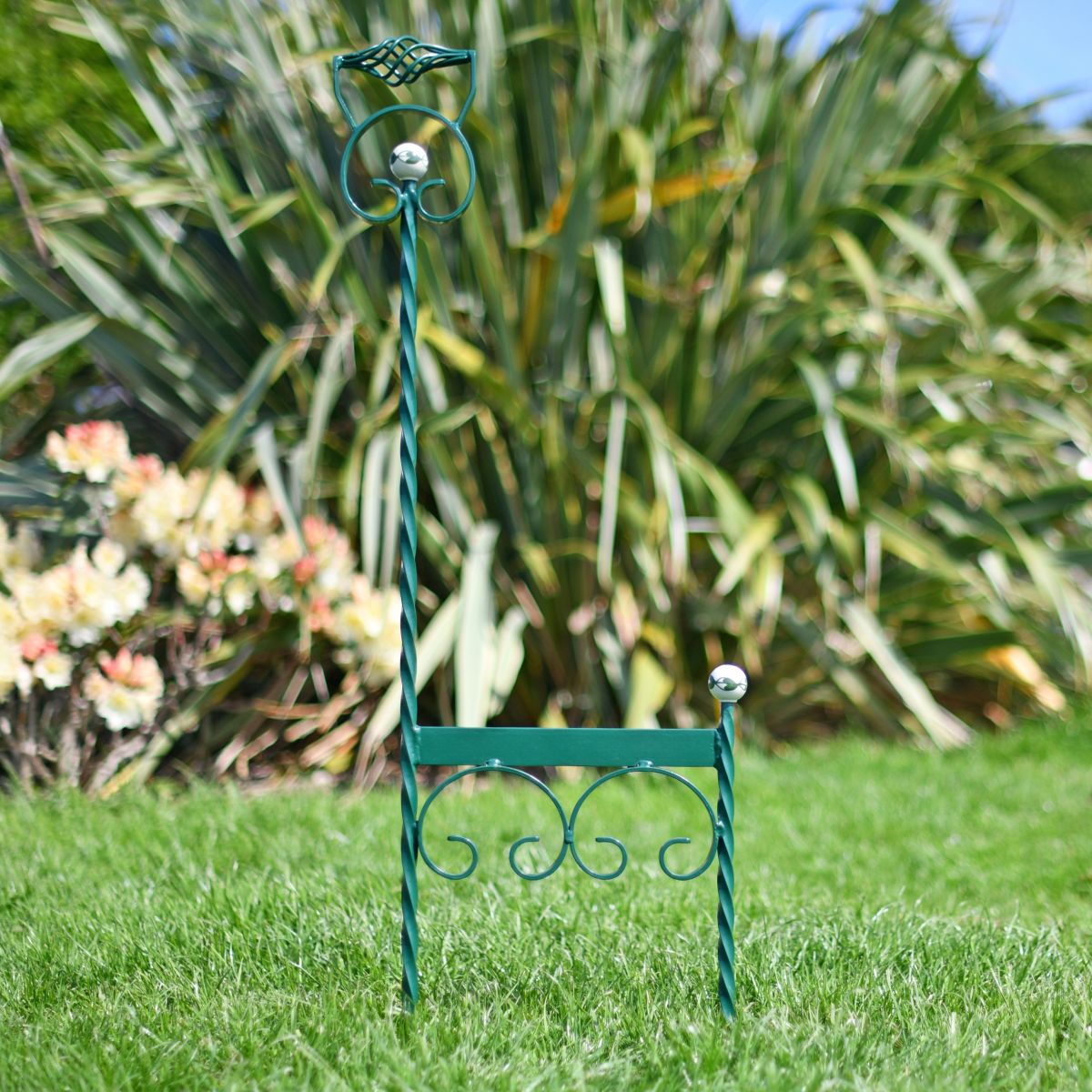 Twist & scroll ground spike boot scraper