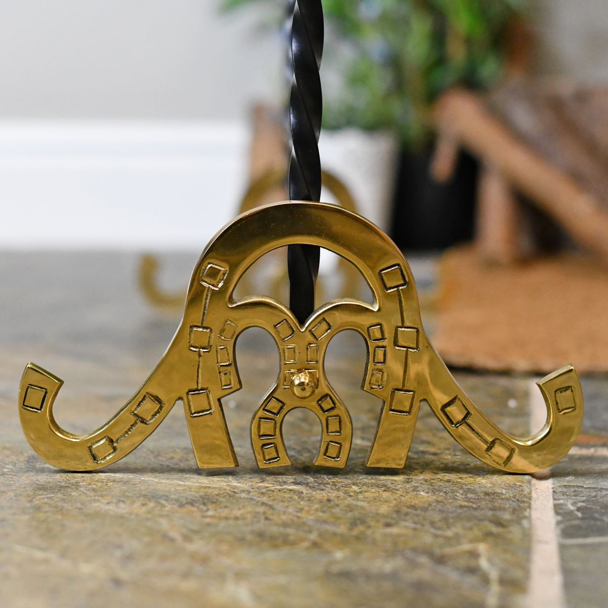 Brass cast horseshoe feet on welly rack stand