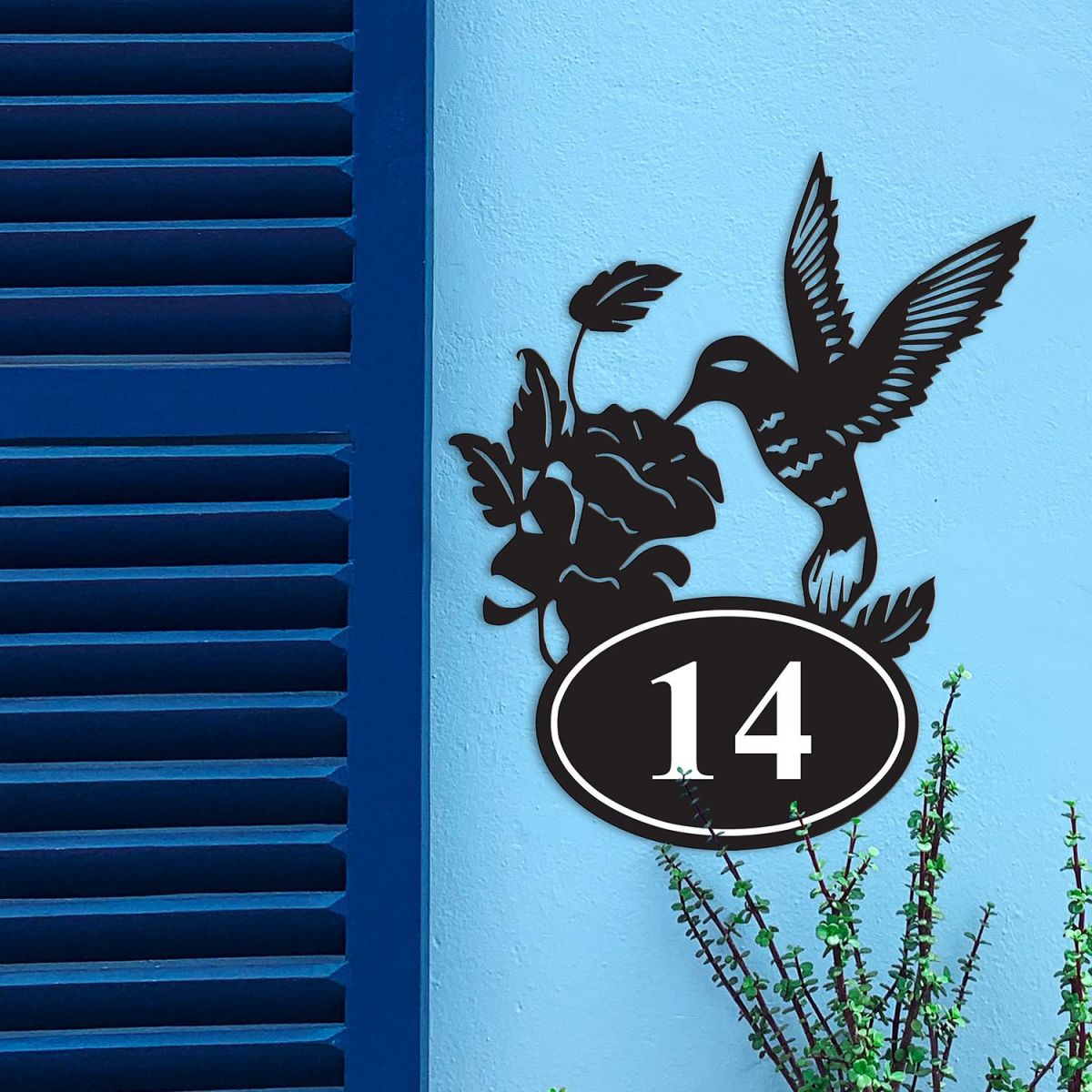 Iron House Number Sign in Situ on a Blue Wall 