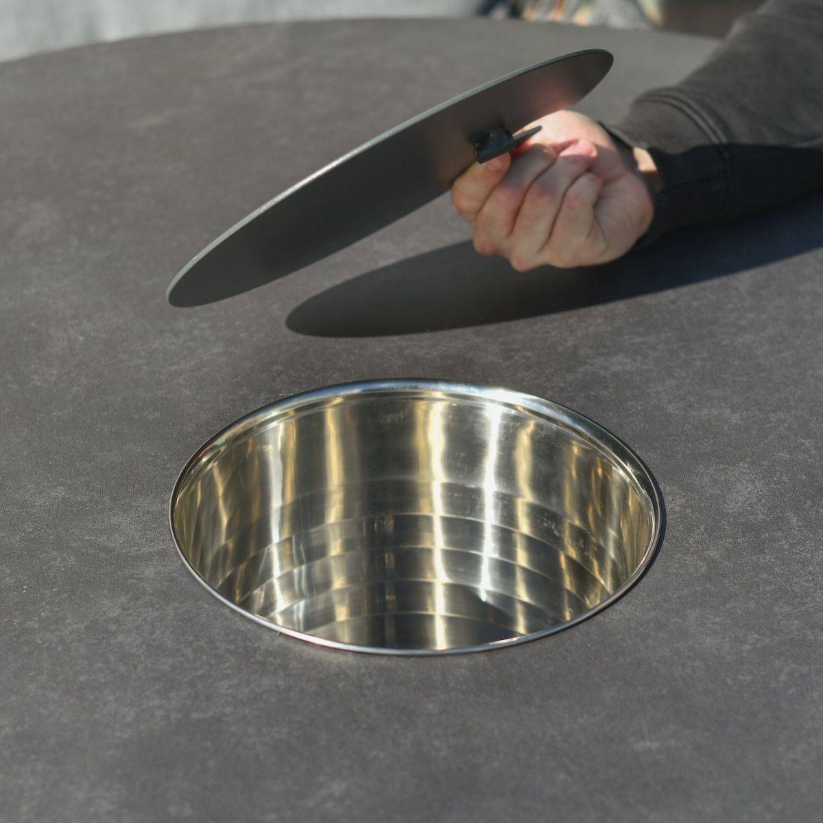 Close up of ice bucket detail on four seater patio table and chairs set