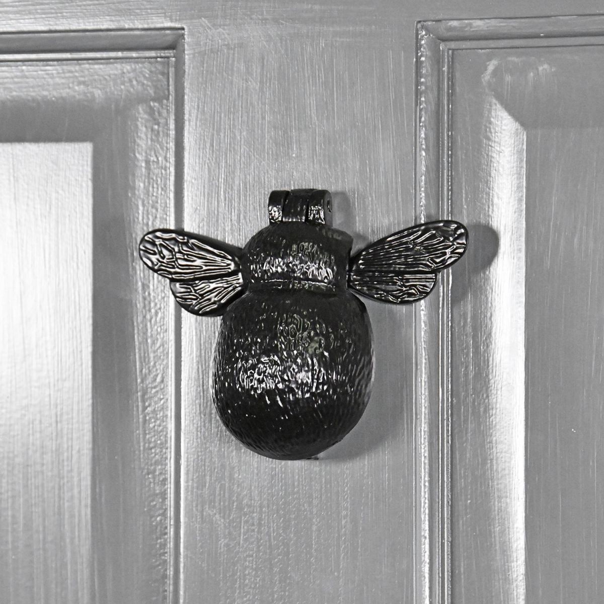 Iron Bumblebee Door Knocker in Situ on a Grey Door