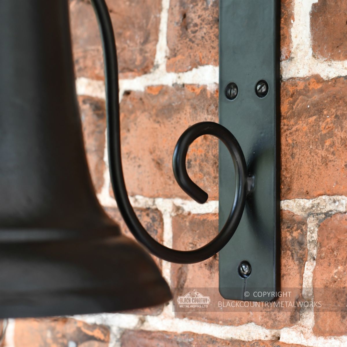 Issadora Trailing Vine Wall Mounted Bell Close Up Of Mounting Plate Issadora Trailing Vine Wall Mounted Bell Close Up Of Mounting Plate