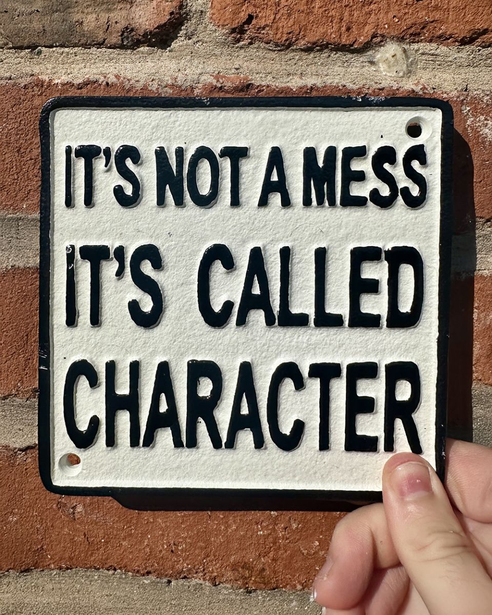 Cast iron it"s not a mess it"s called character wall sign