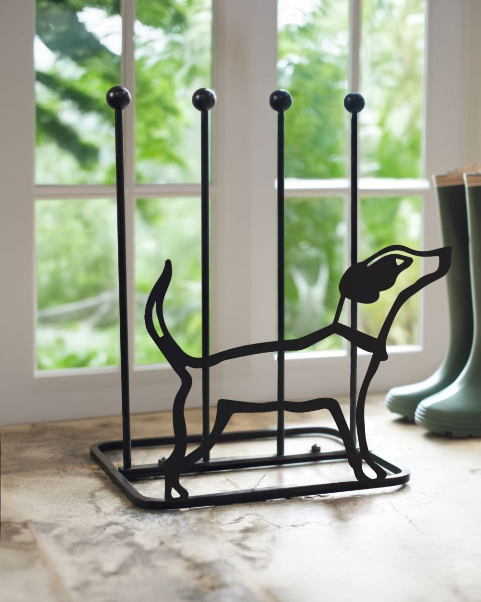 Jack Russell boot rack by patio doors