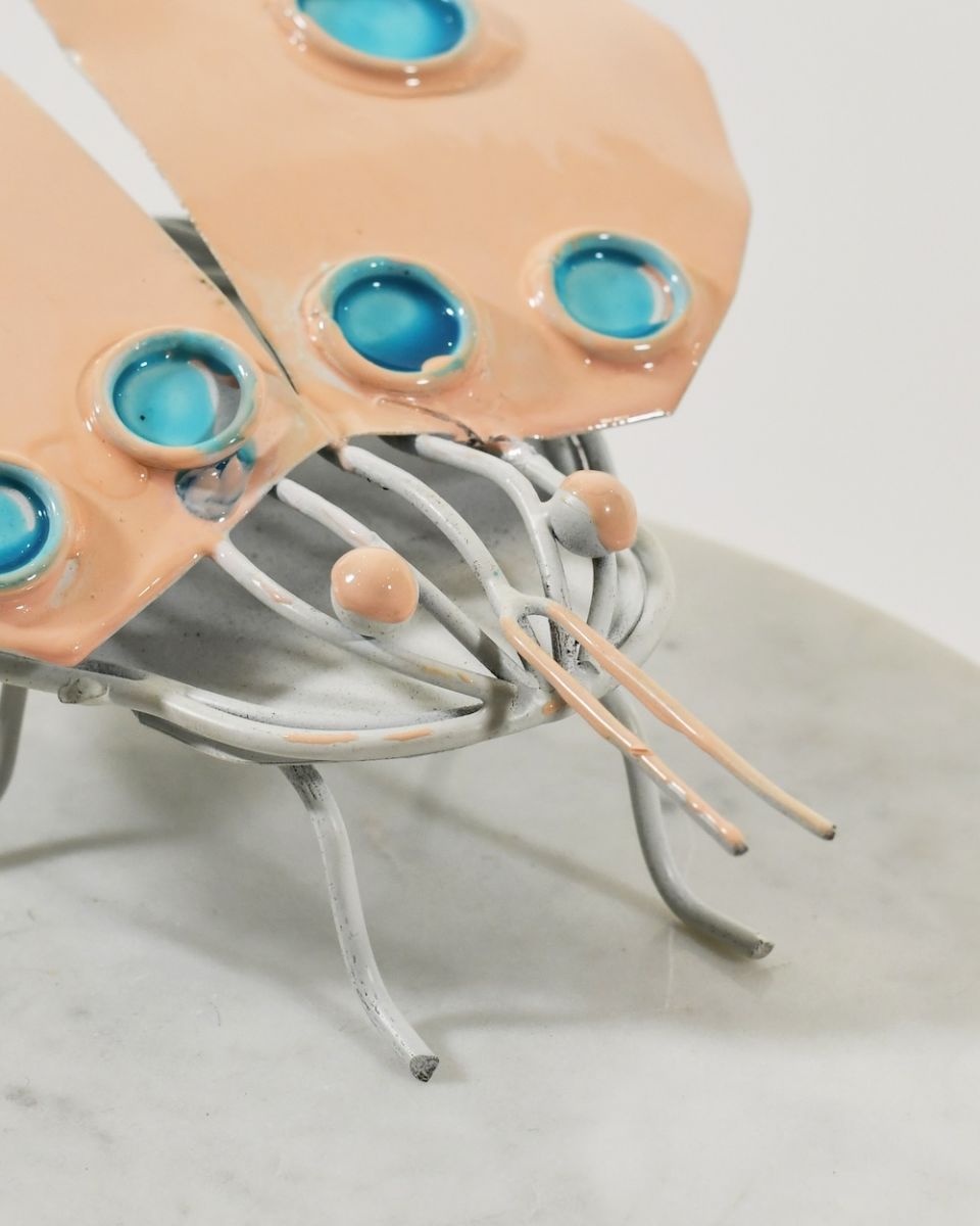 Close up of face detail on recycled metal art sculpture Close up of face detail on recycled metal art sculpture