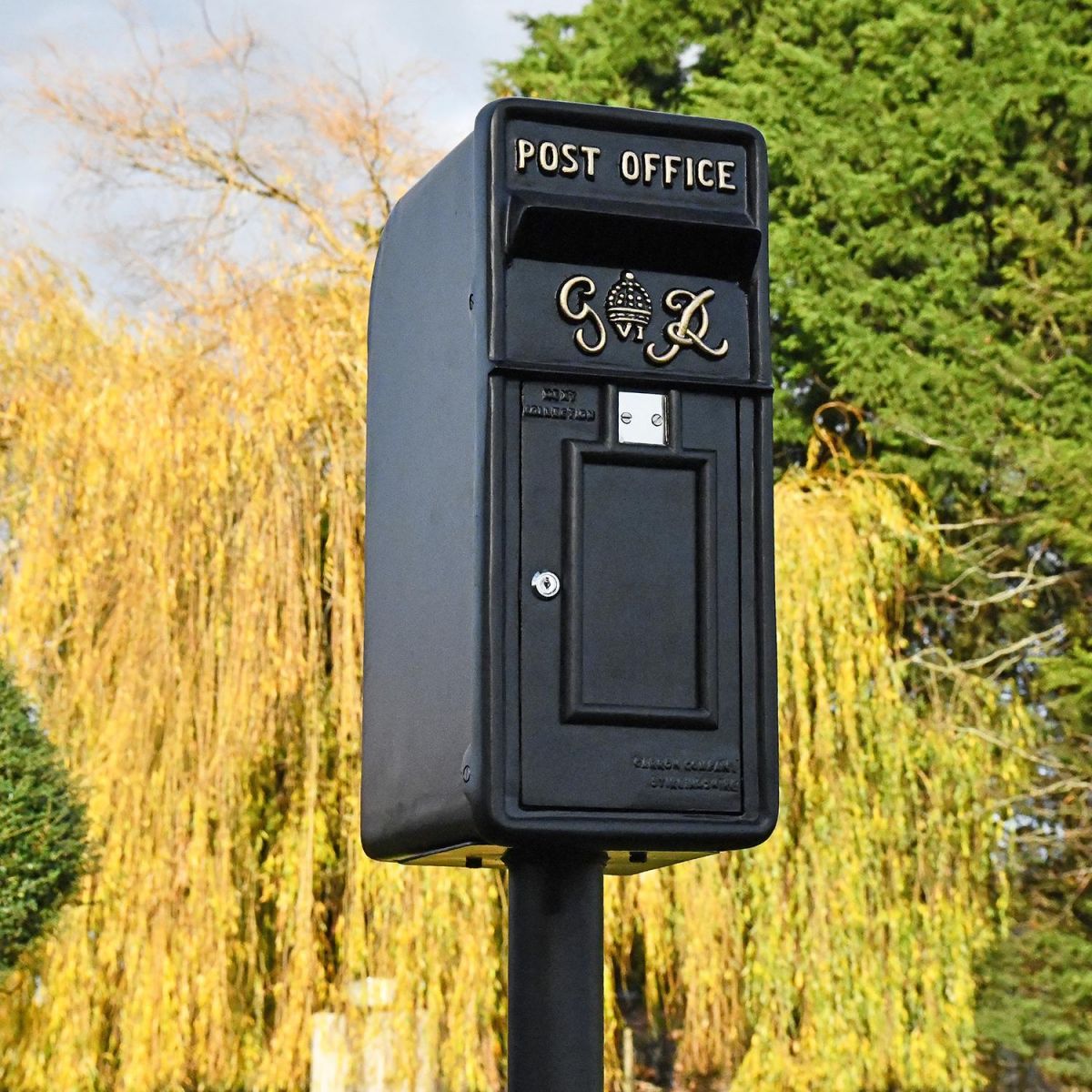 King George Rex Black Period Post Box in the Garden