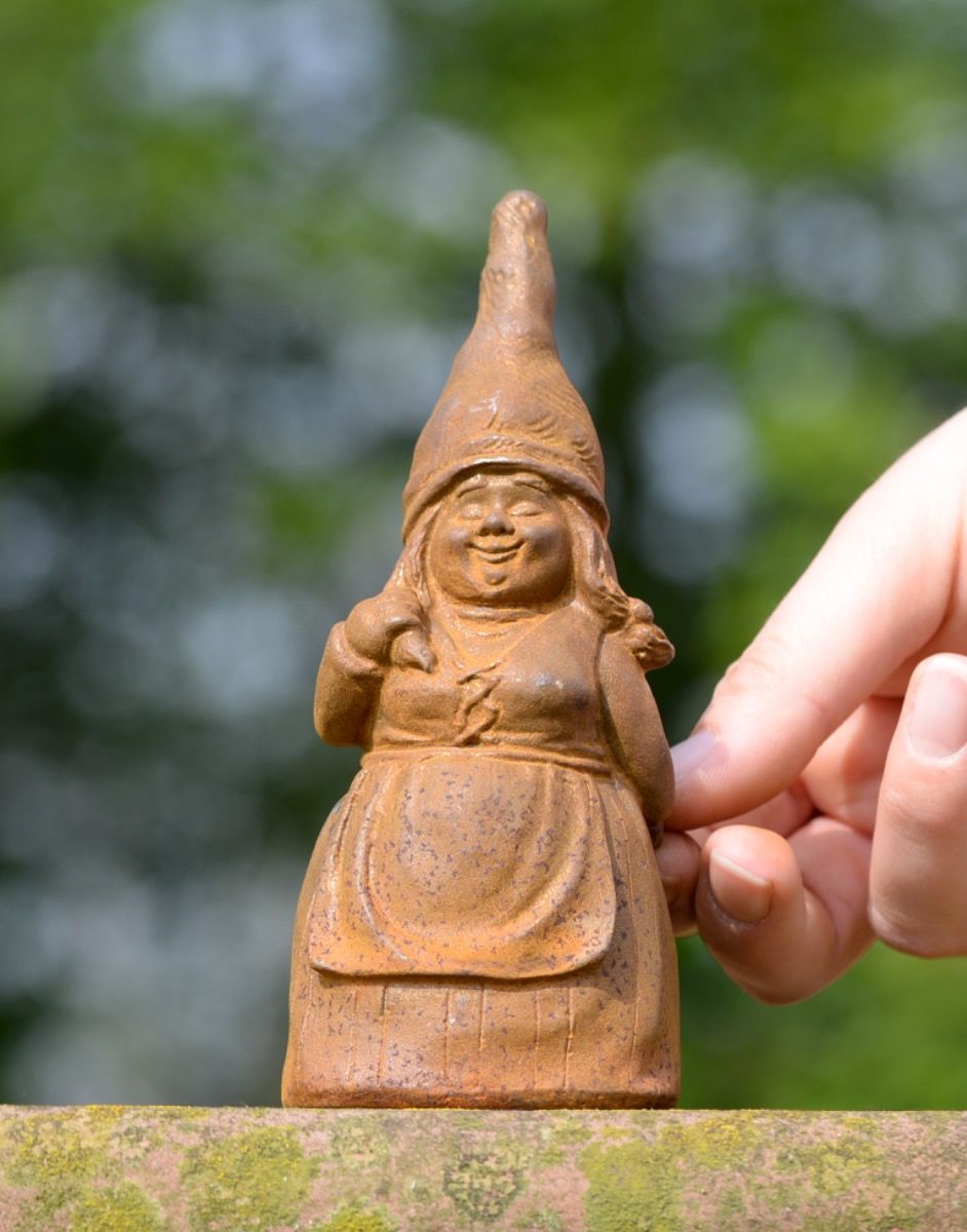 Scale of Cast Iron Lady Gnome Sculpture
