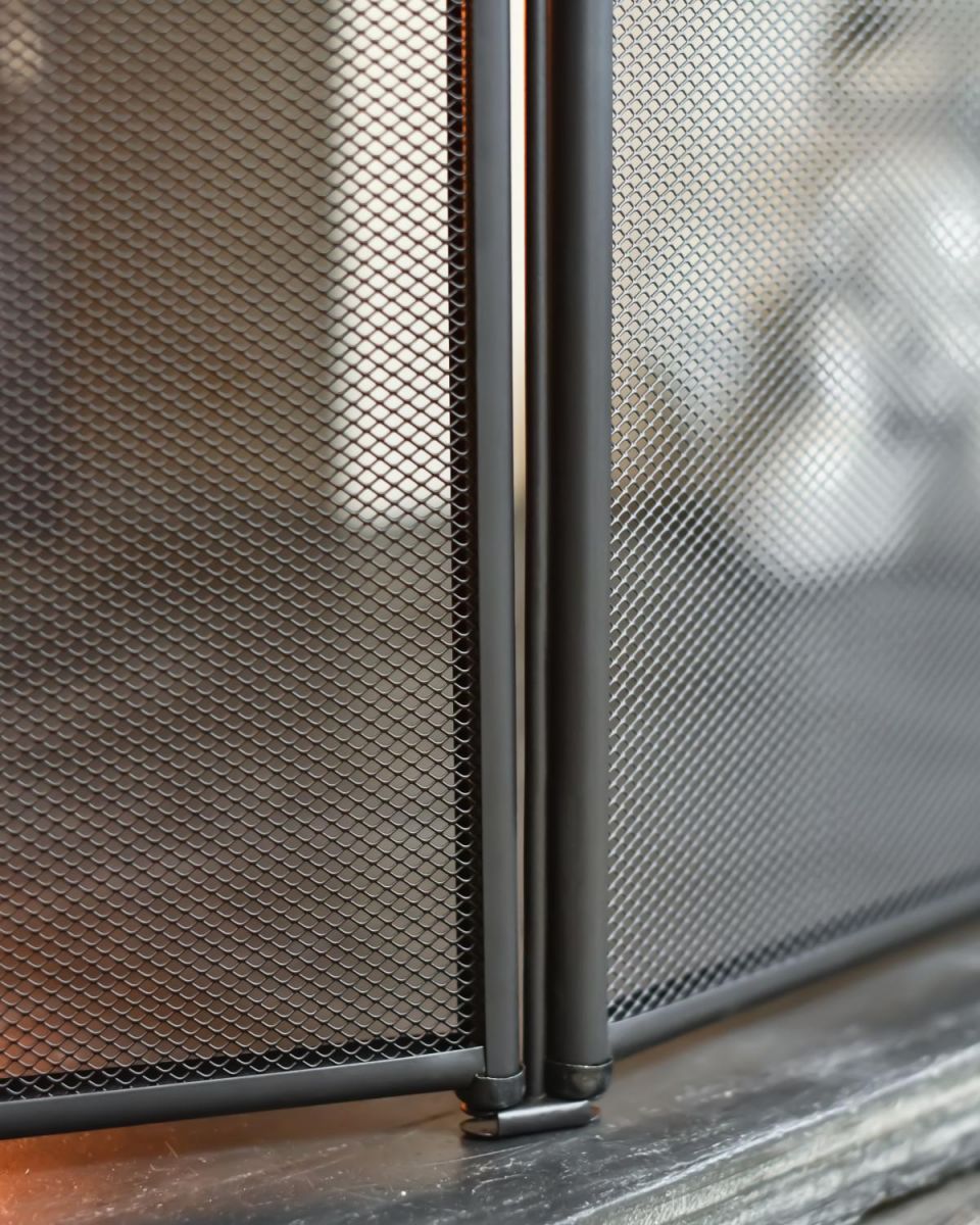 Close Up Of Large Black Four Fold Fire Guard Mesh