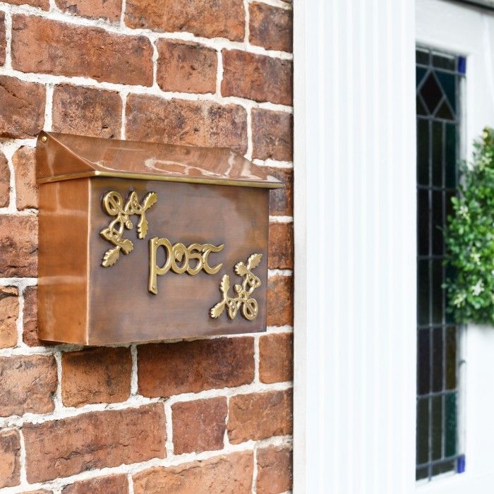 Antique Copper and Bass Celtic Design Post Box in Situ on a Wall