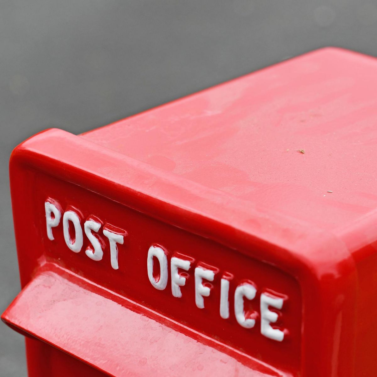 "Post Office" Embossed Text on the Front of the Post Box