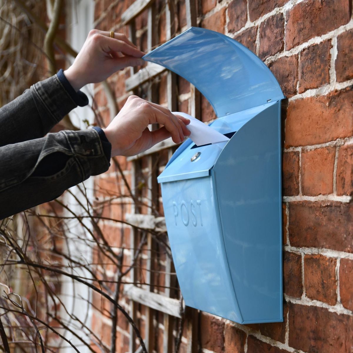 Side view of “Spring Skies” Post Box on Wall