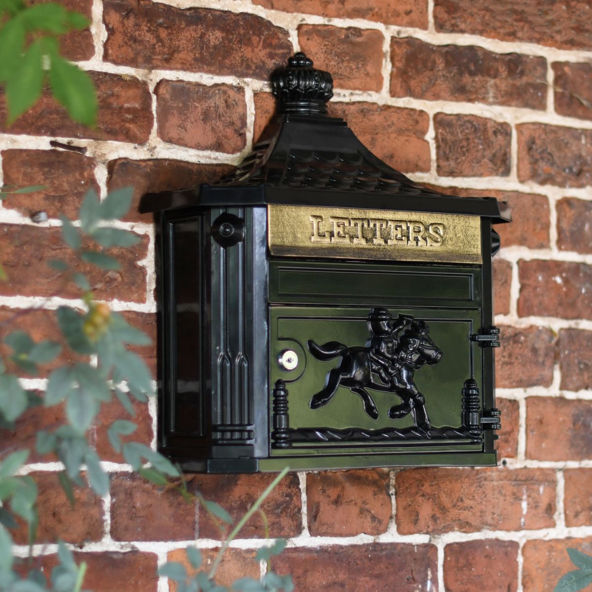 Huntingdon Post box finished in black on Town House Wall
