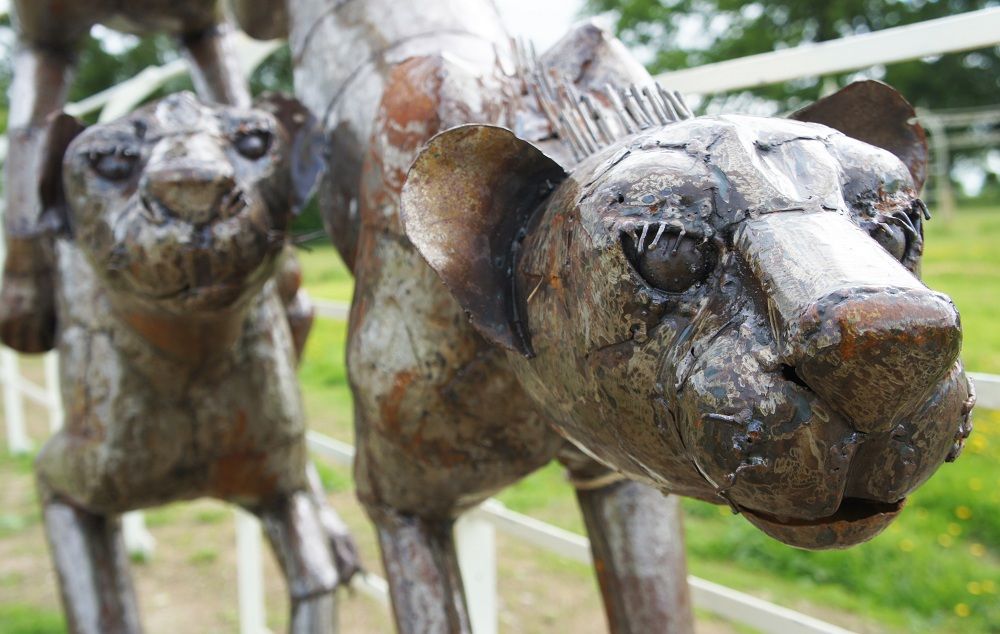 “Milani Pride” Leaping Cheetah Sculpture