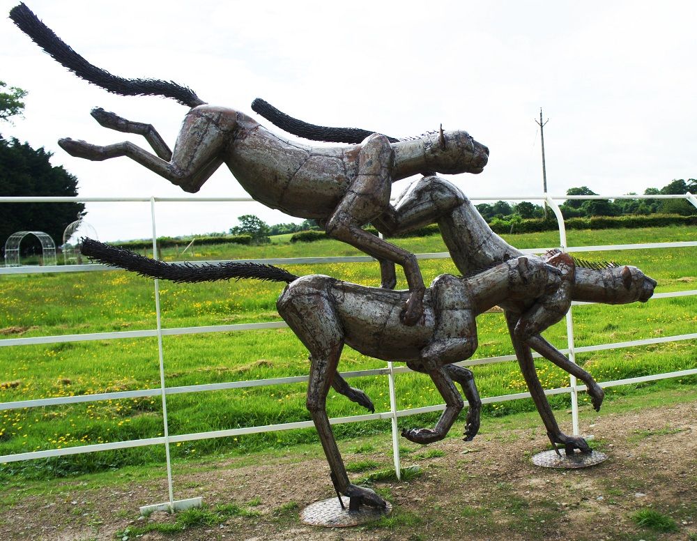 “Milani Pride” Leaping Cheetah Sculpture