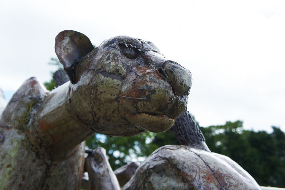 “Milani Pride” Leaping Cheetah Sculpture