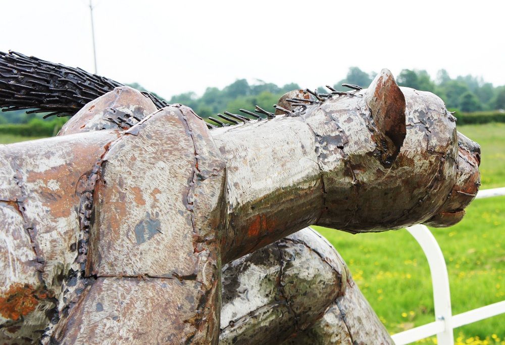 “Milani Pride” Leaping Cheetah Sculpture