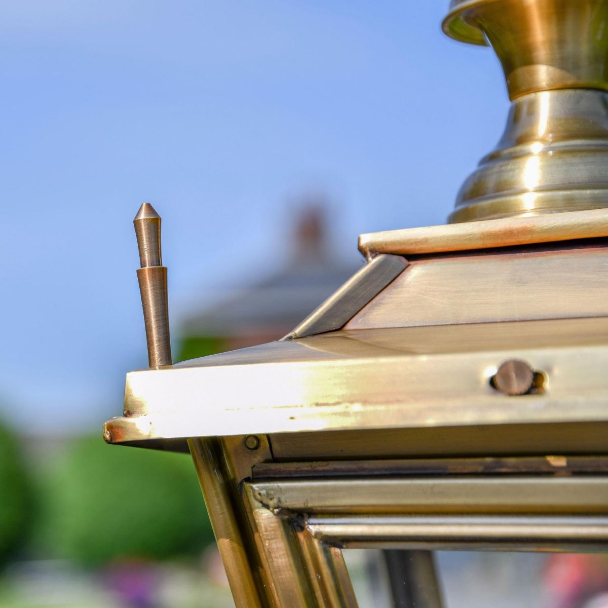 Close up of corner finial on Antique Brass Finial