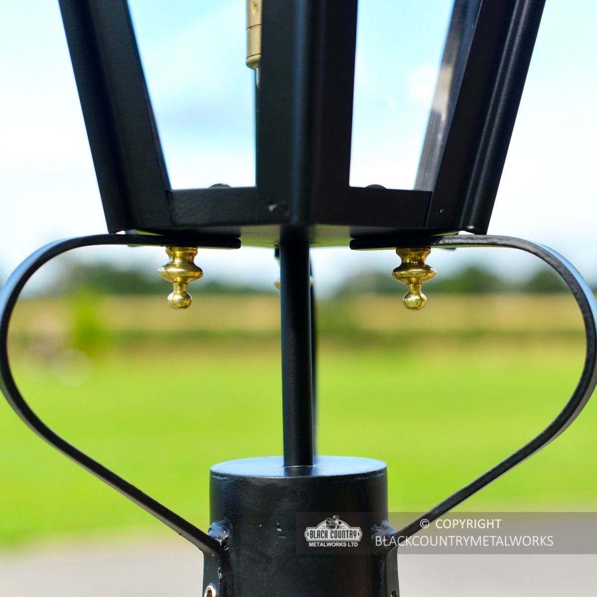 Close-up of the Frog Collar and Brass Fixings on the Black Hexagonal Pillar Light