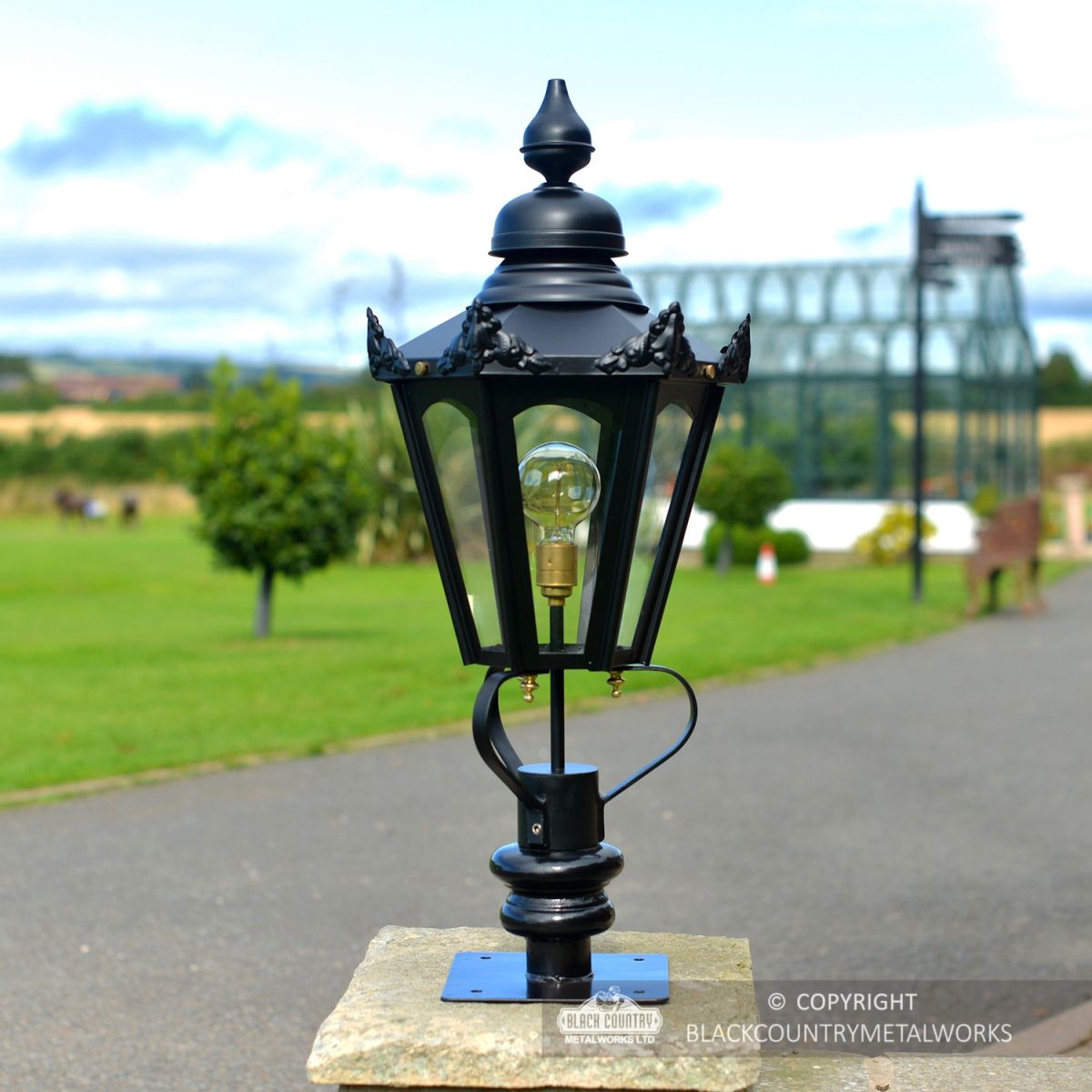 Black Hexagonal Pillar Light and Lantern Set in Situ on the Driveway