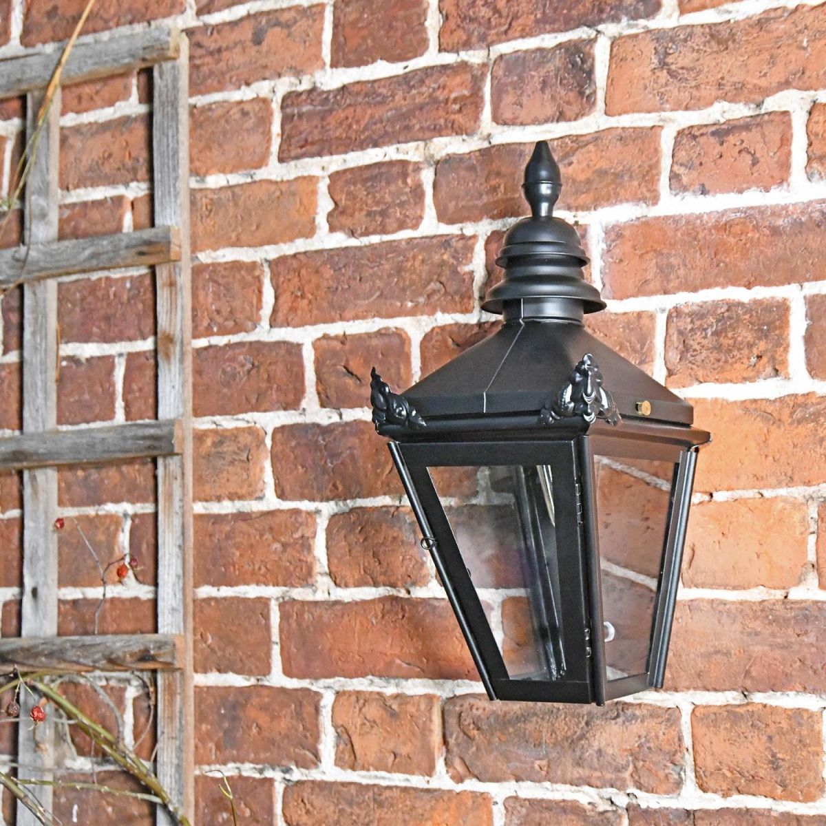 Harrogate Black Wall Lantern mounted to wall 