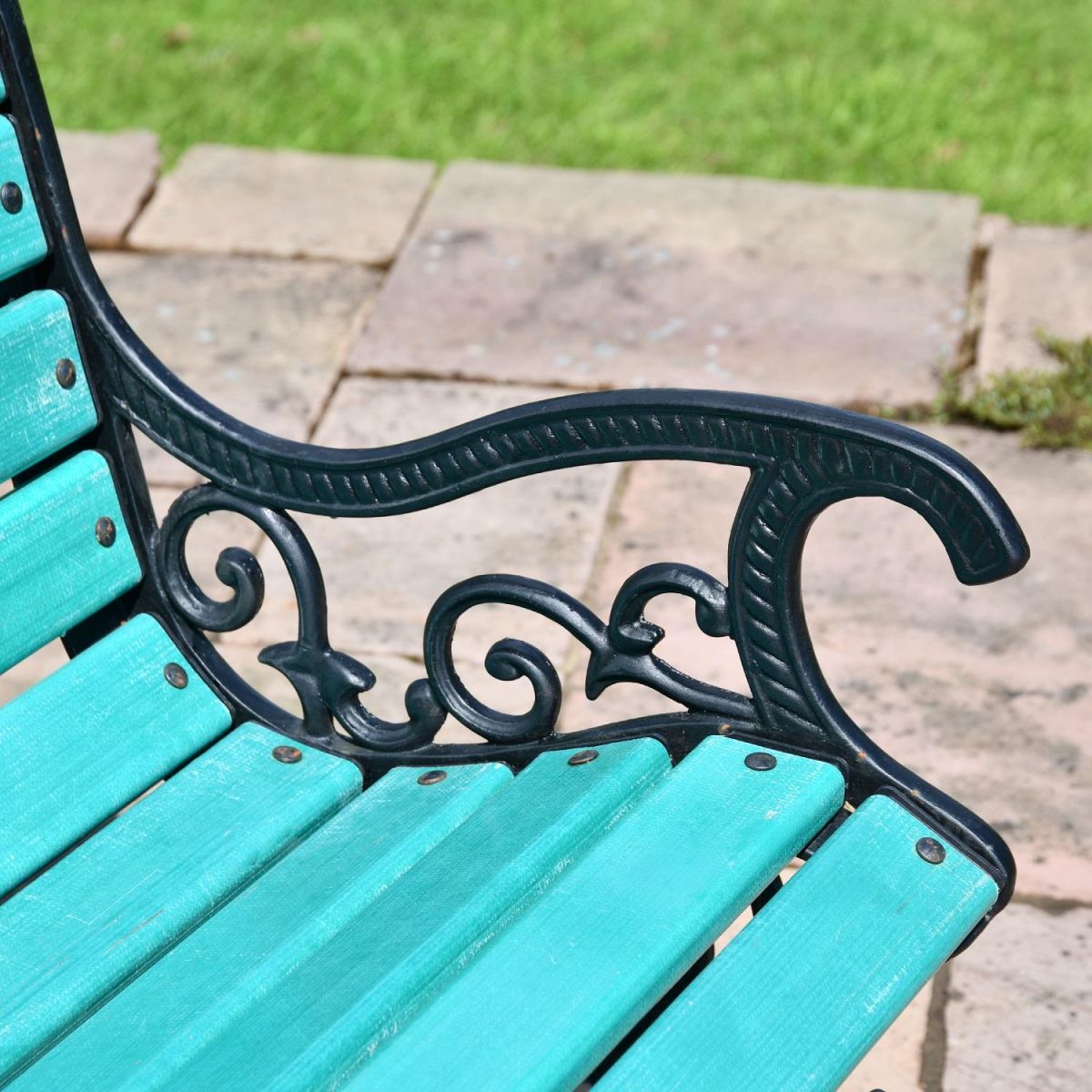 Close up of Green Victorian Park Bench