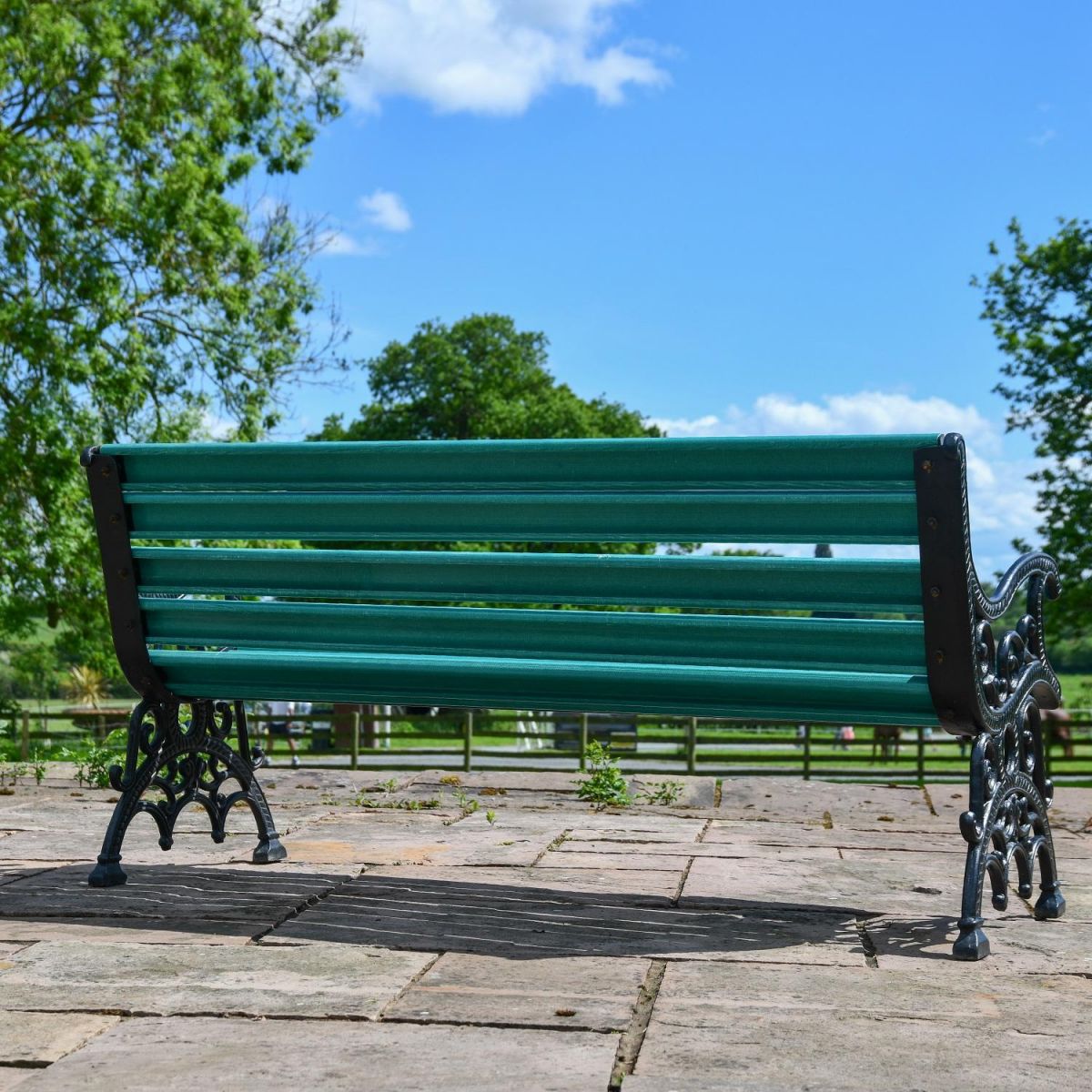 Rear view of Green Victorian Park Bench