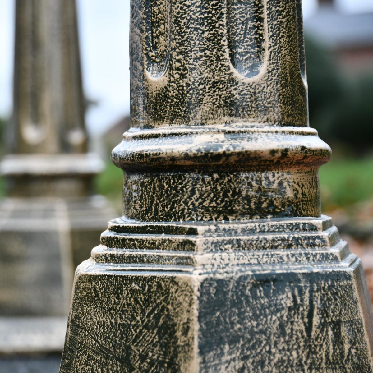 Close up of column and tiered base  Close up of column and tiered base