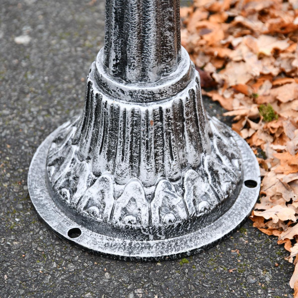 Close up of driveway bollard with drilled holes 