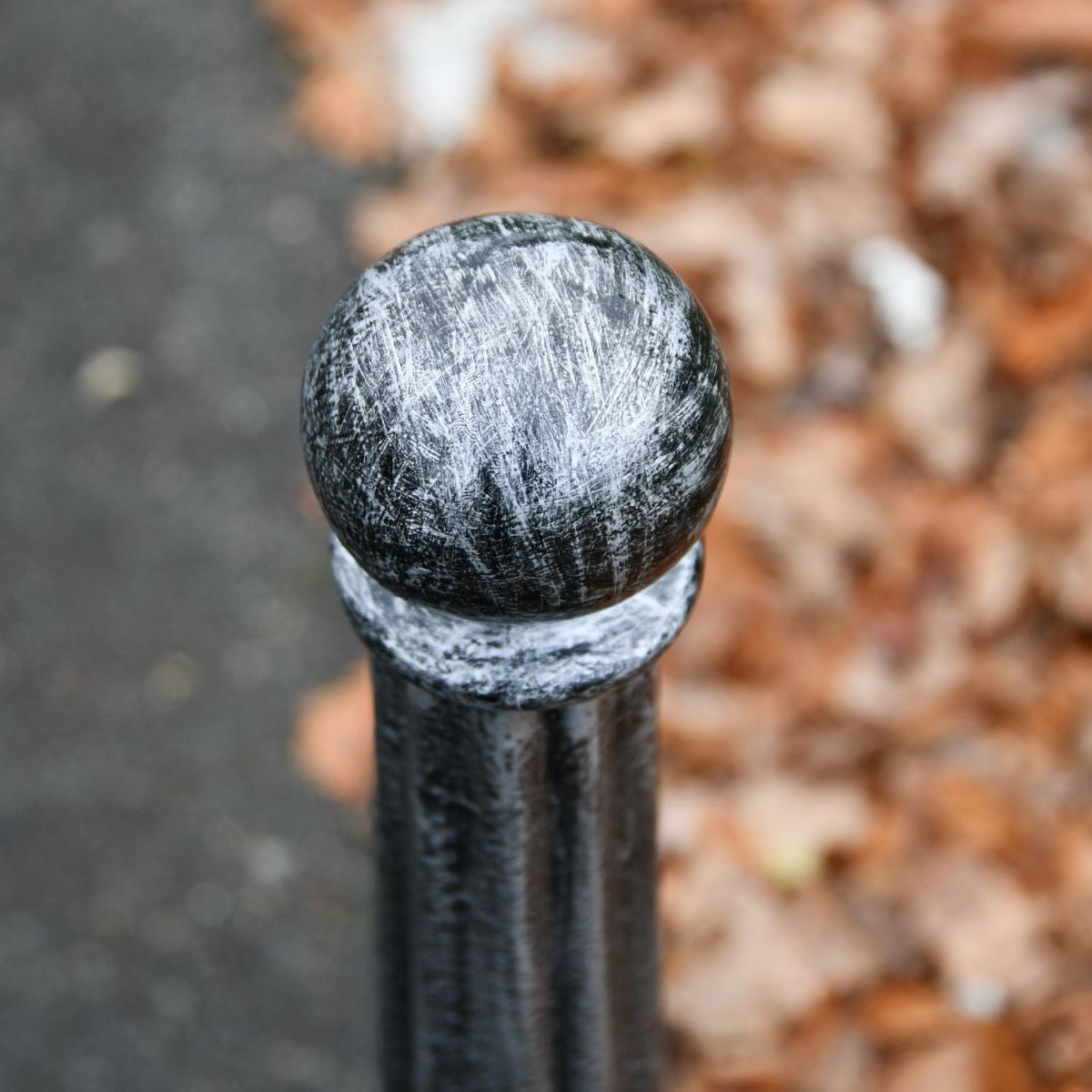 Close up of ball top on bollard 