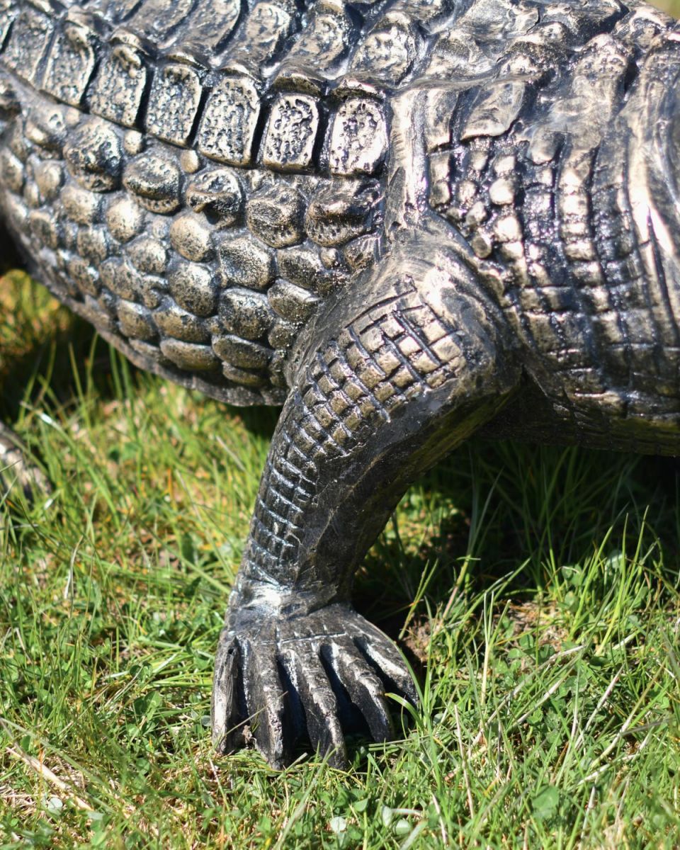 Close-Up of Antique Gold Finish on Crocodile Garden Sculpture