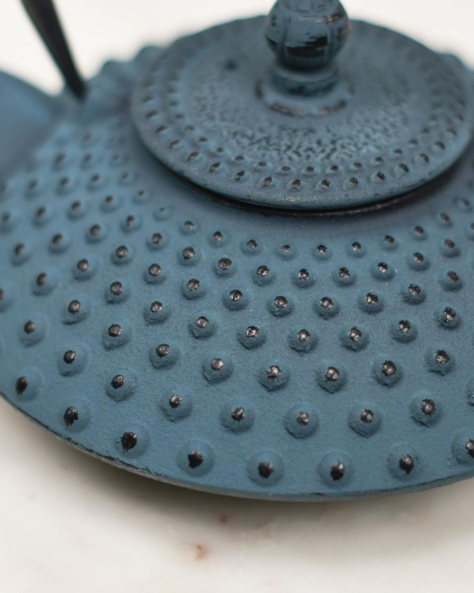 Close-Up of Light Blue & Black Cast Iron "Ushirode Kyusu" Japanese Style Teapot in Situ Close-Up of Light Blue & Black Cast Iron "Ushirode Kyusu" Japanese Style Teapot in Situ