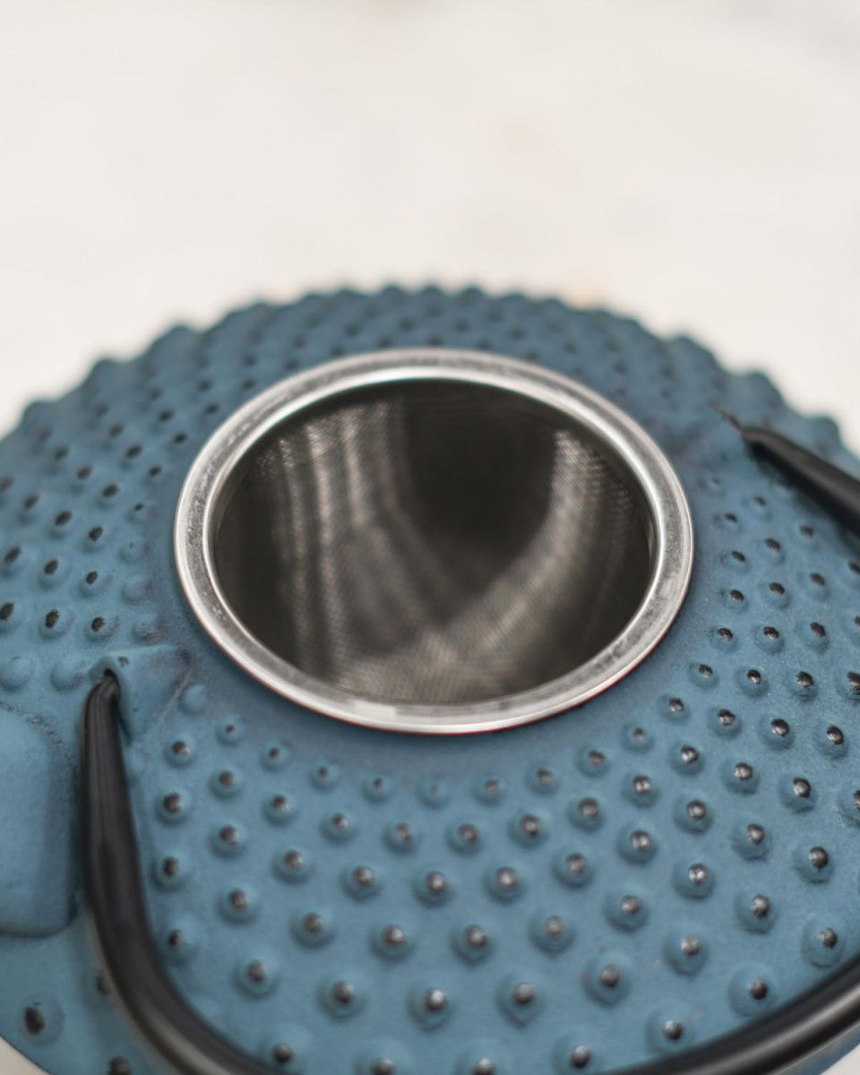 Close-Up of Tea Infuser for Light Blue & Black Cast Iron "Ushirode Kyusu" Japanese Style Teapot Close-Up of Tea Infuser for Light Blue & Black Cast Iron "Ushirode Kyusu" Japanese Style Teapot