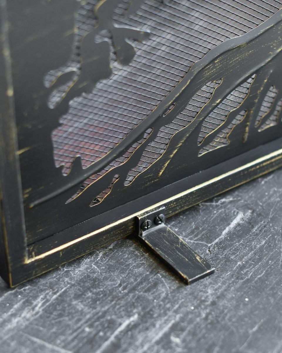 Close Up Of "Lignum Vitae" Brushed Gold Fire Guard Feet Close Up Of "Lignum Vitae" Brushed Gold Fire Guard Feet