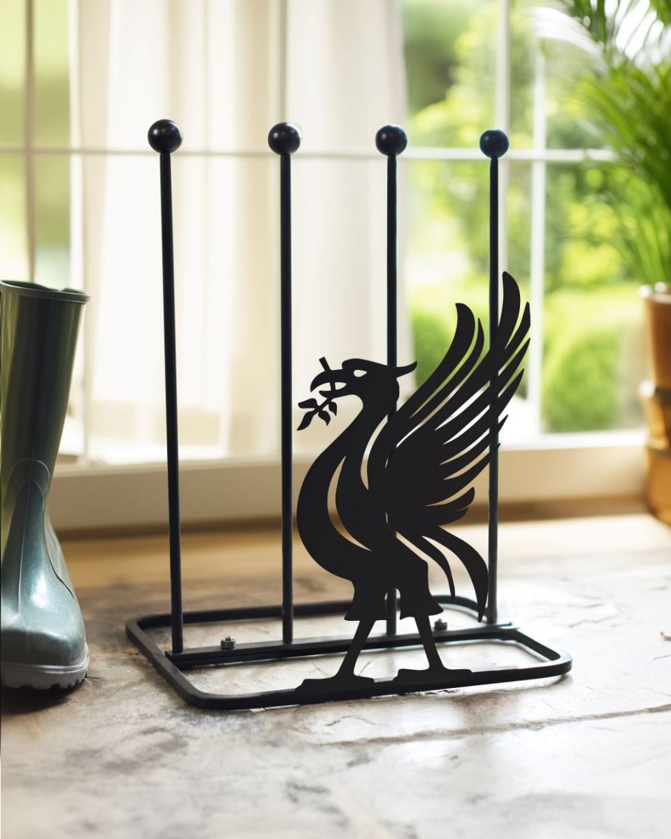 Liver bird boot rack in front of back door Liver bird boot rack in front of back door