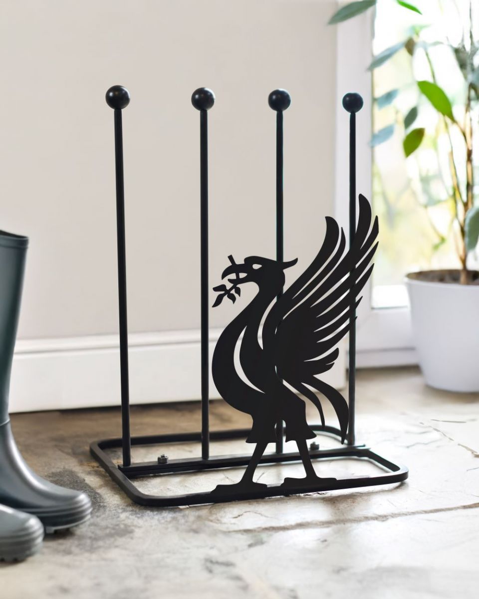 Liver bird boot rack with white wall behind Liver bird boot rack with white wall behind