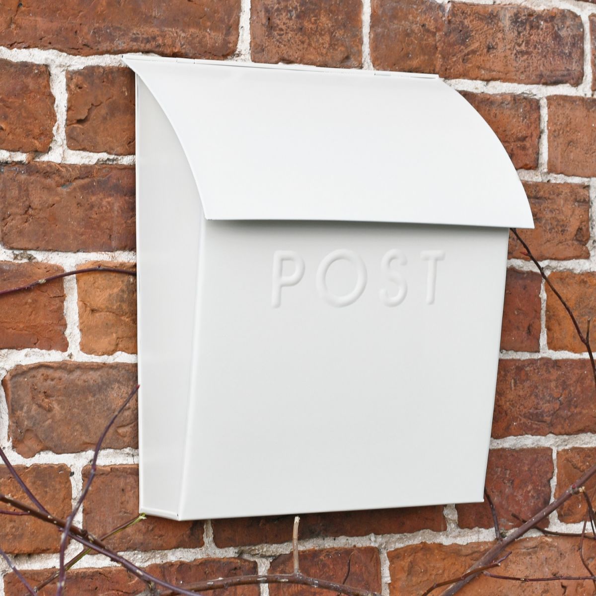 White Lockable Contemporary Post Box In Situ
