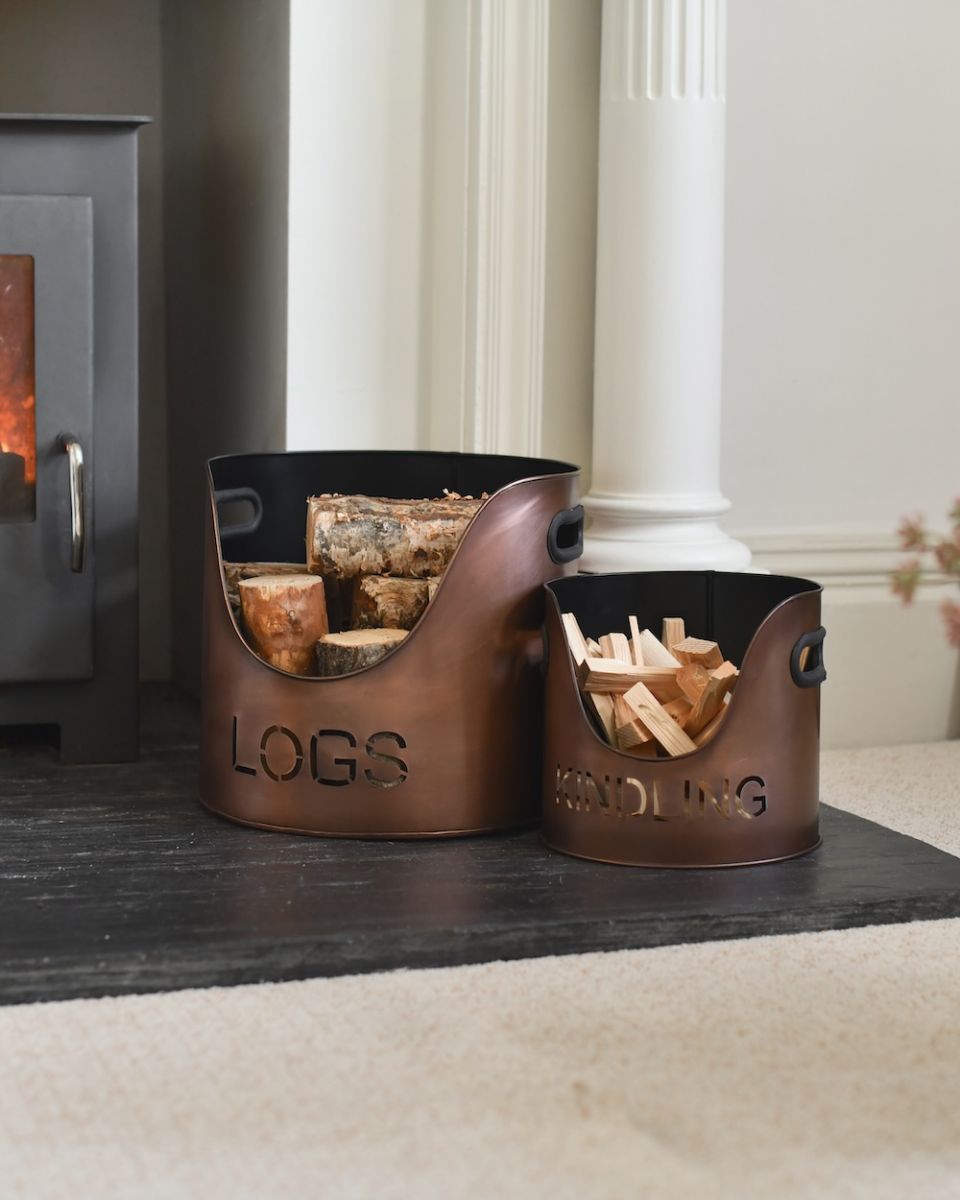 in situ photo of antique copper log and kindling buckets set of two