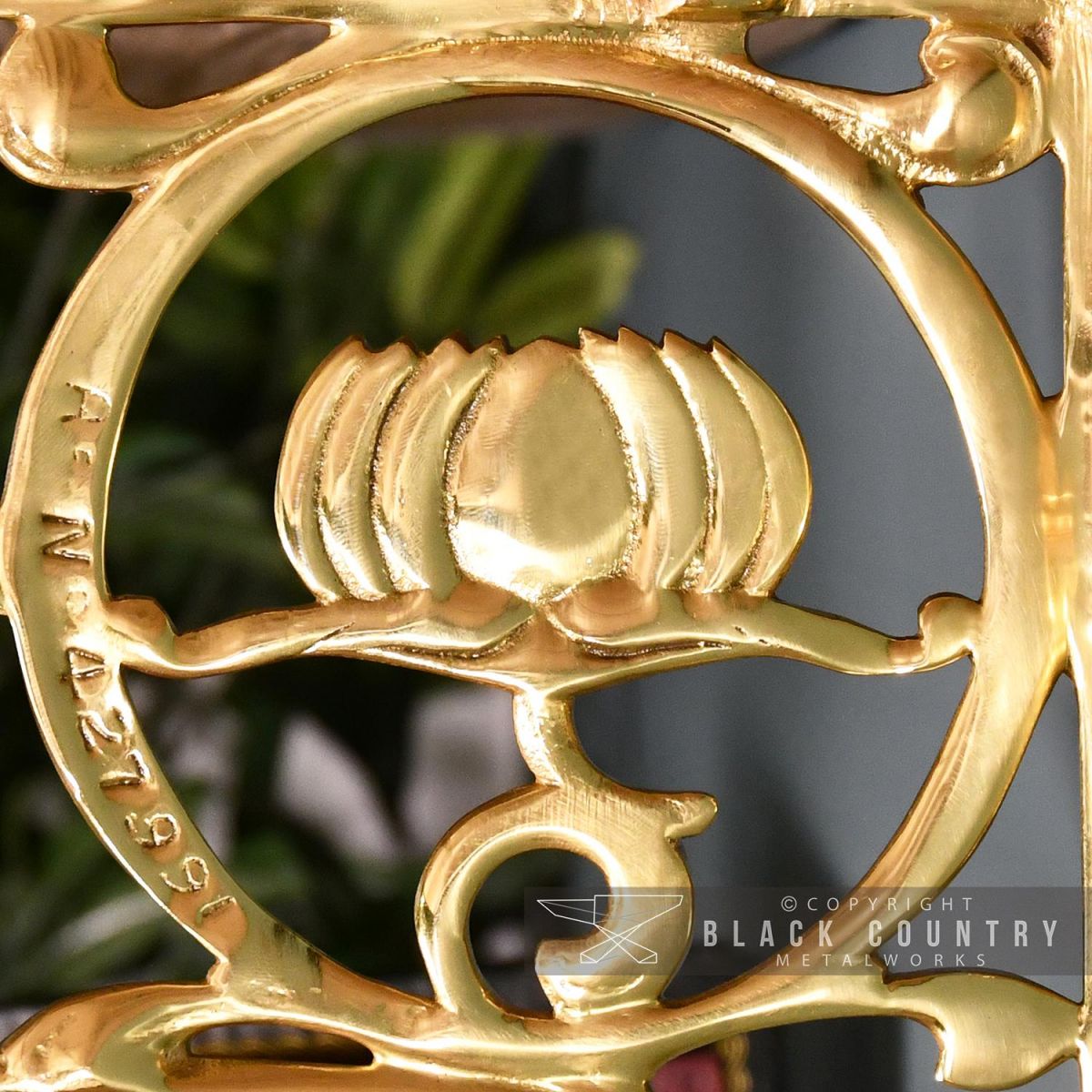 Close-up of the "Lotus Flower"Design on the Shelf Bracket