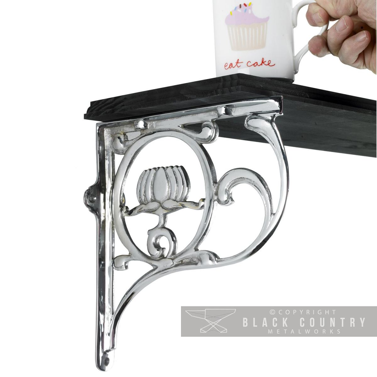 "Lotus Flower" Bright Chrome Wall Bracket Holding Up a Black Shelf "Lotus Flower" Bright Chrome Wall Bracket Holding Up a Black Shelf