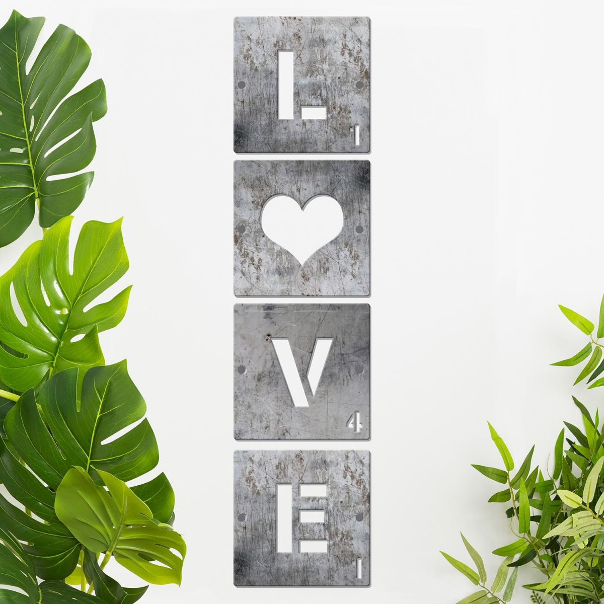 "LOVE" Scrabble Square Letters on a Cream Wall