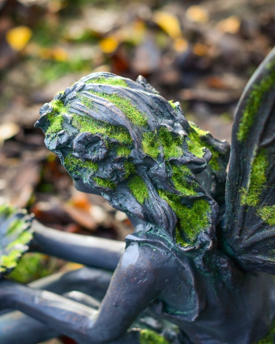 Lyra the generous resin fairy garden sculpture over the shoulder