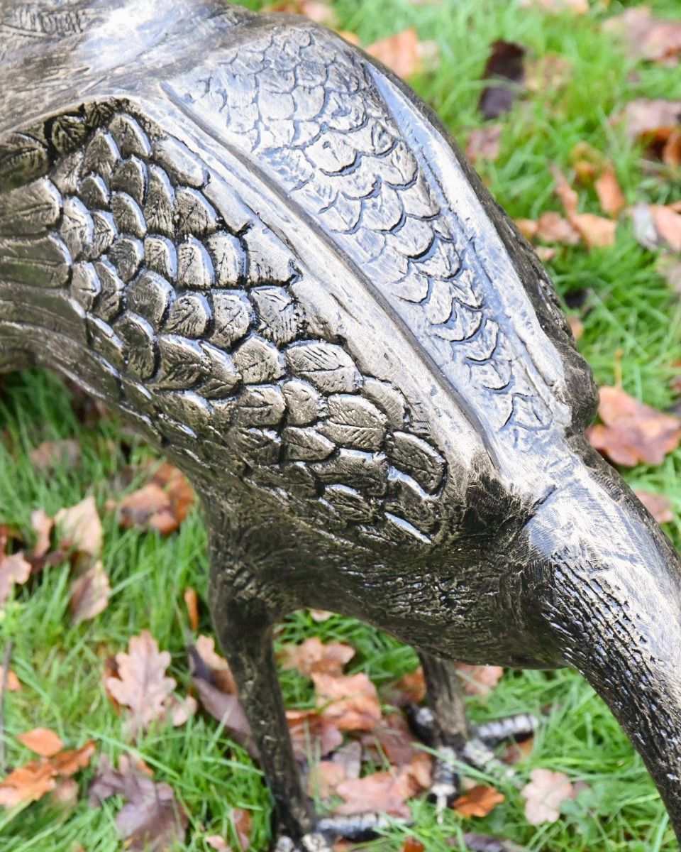 Close-up of the Antique Bronze Finish on the Majestic Peacock Sculpture