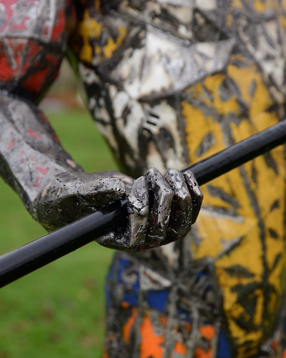 ‘Vertigo’ the Tightrope Walker Upcycled Oil Drum Garden Sculpture close up of detailed hand gripping balancing pole