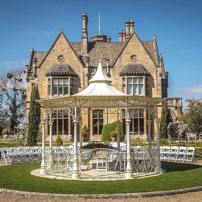 "Lady Leticia Dream Carousel" Bandstand Pavilion in Use Outside Manor House - Manor By The Lake