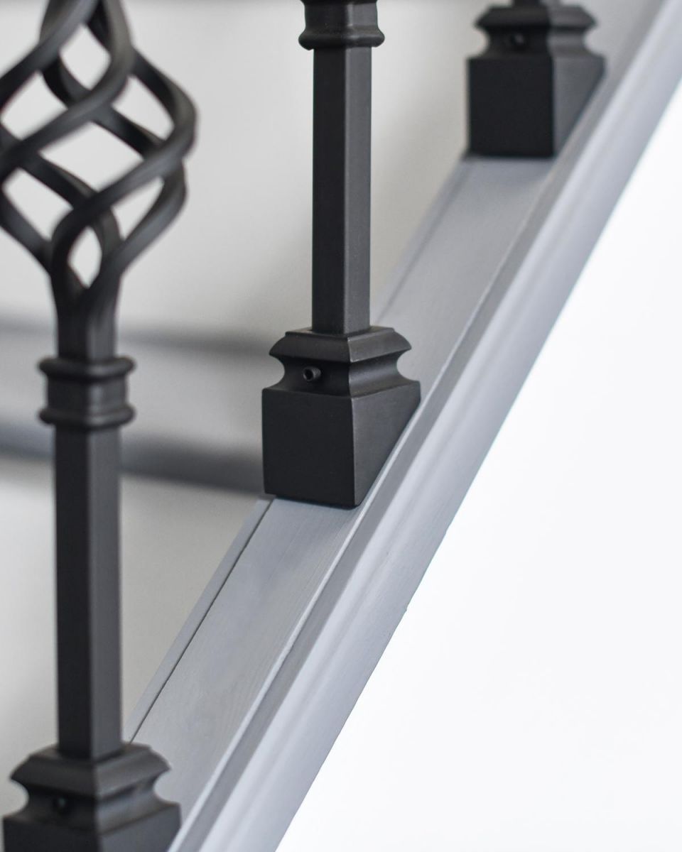 Fixed Angled Brackets on the Bottom of the Stair Spindles