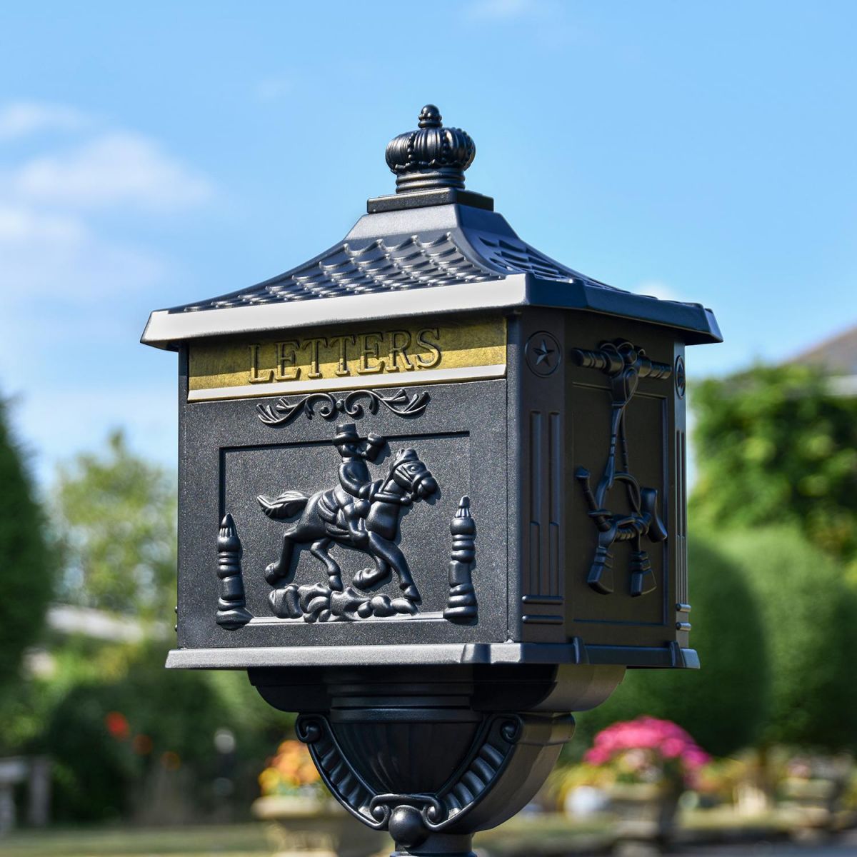 Matt Black Freestanding Huntingdon Post Box in Situ in the Garden