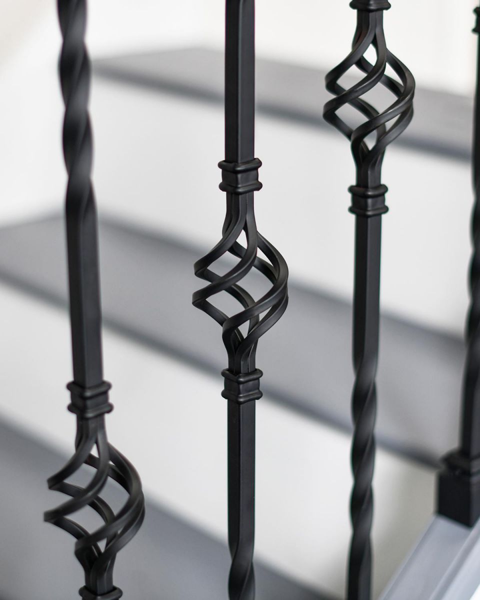 Ornate Traditional Baskets on the Stair Spindle