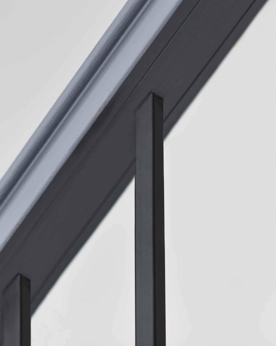 Close-Up of Fitting for Matte Black "Enfield" Single Basket Stair Spindle